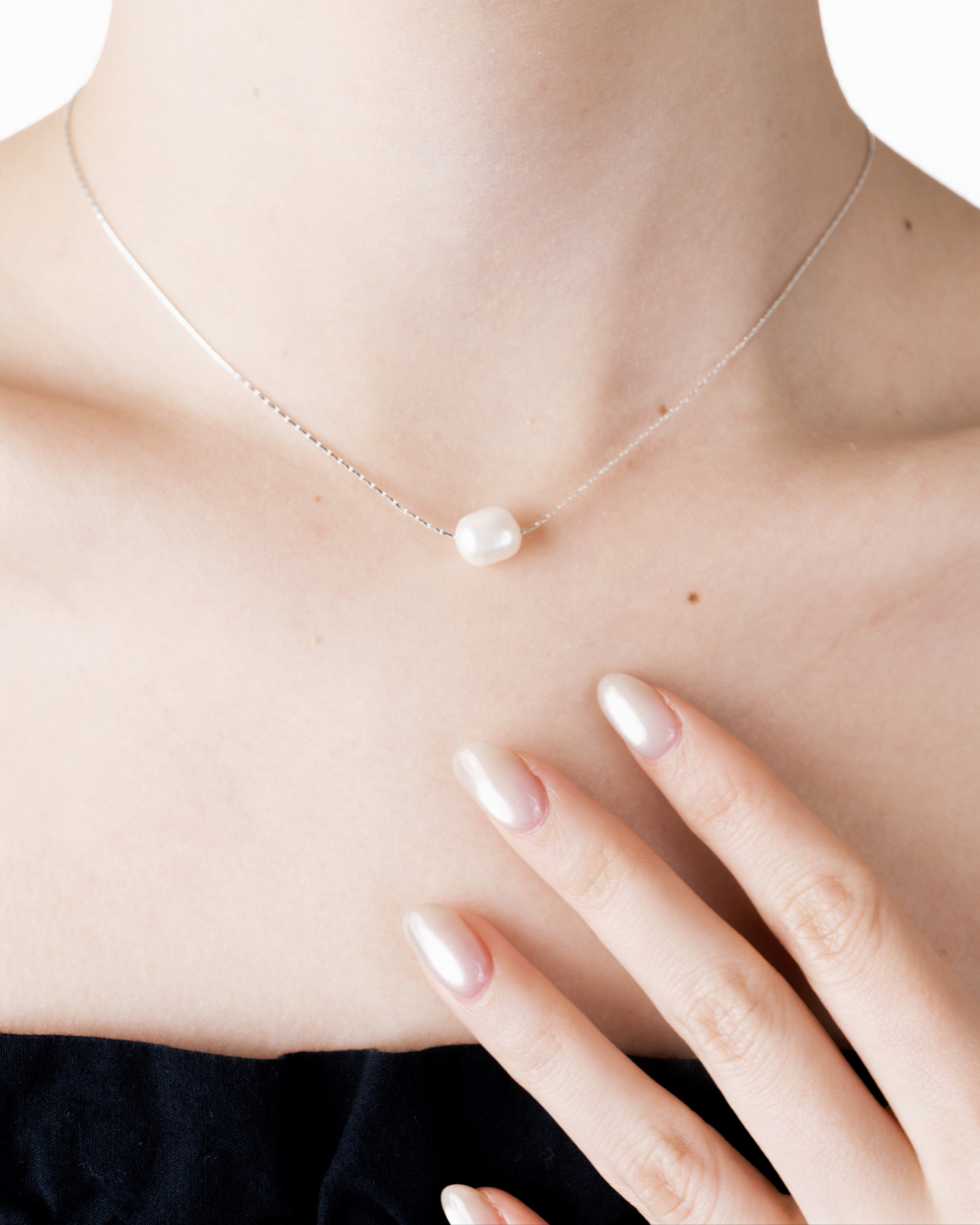 Close-up of irregular freshwater pearl on Rika necklace