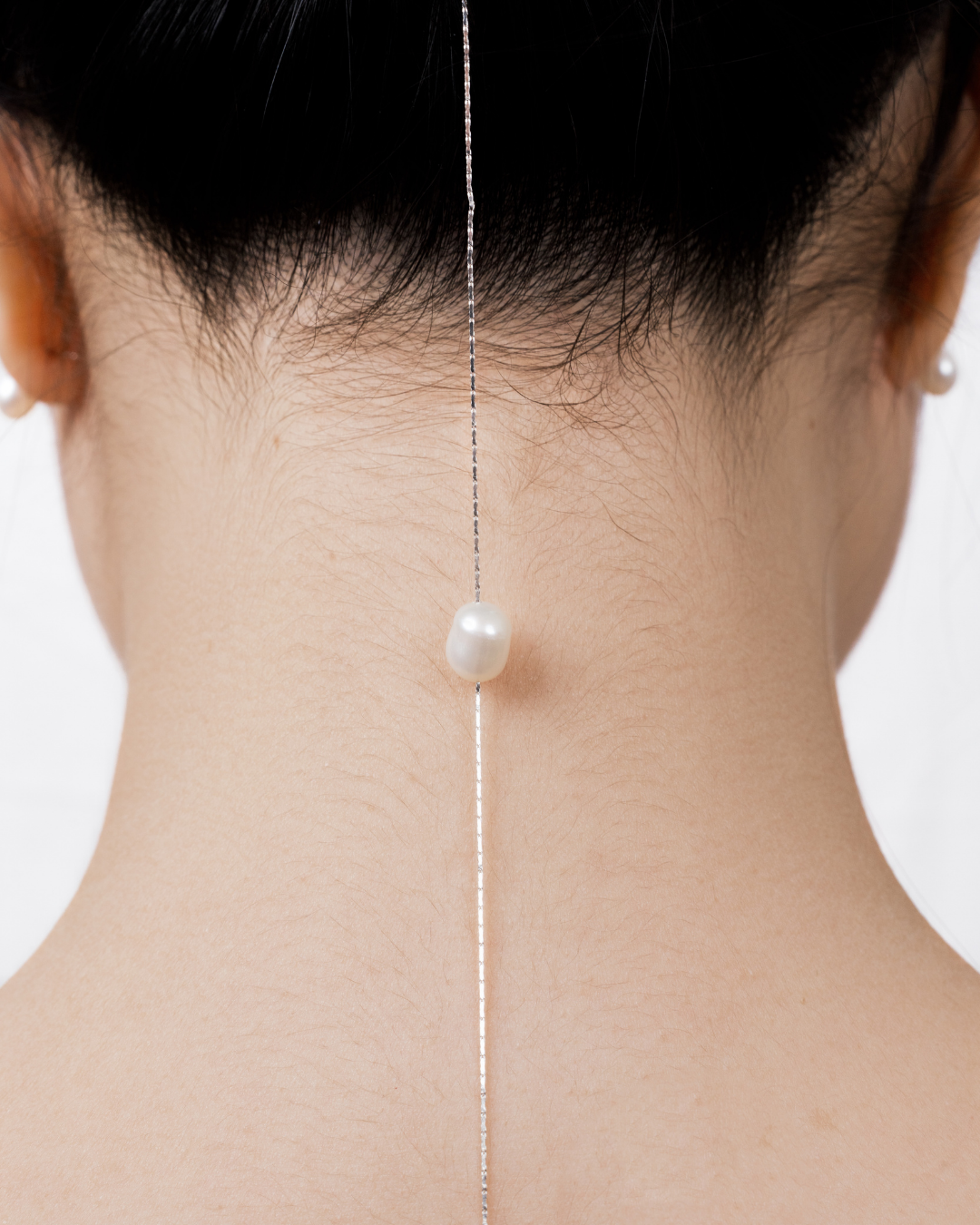 Close-up of irregular freshwater pearl on Rika necklace