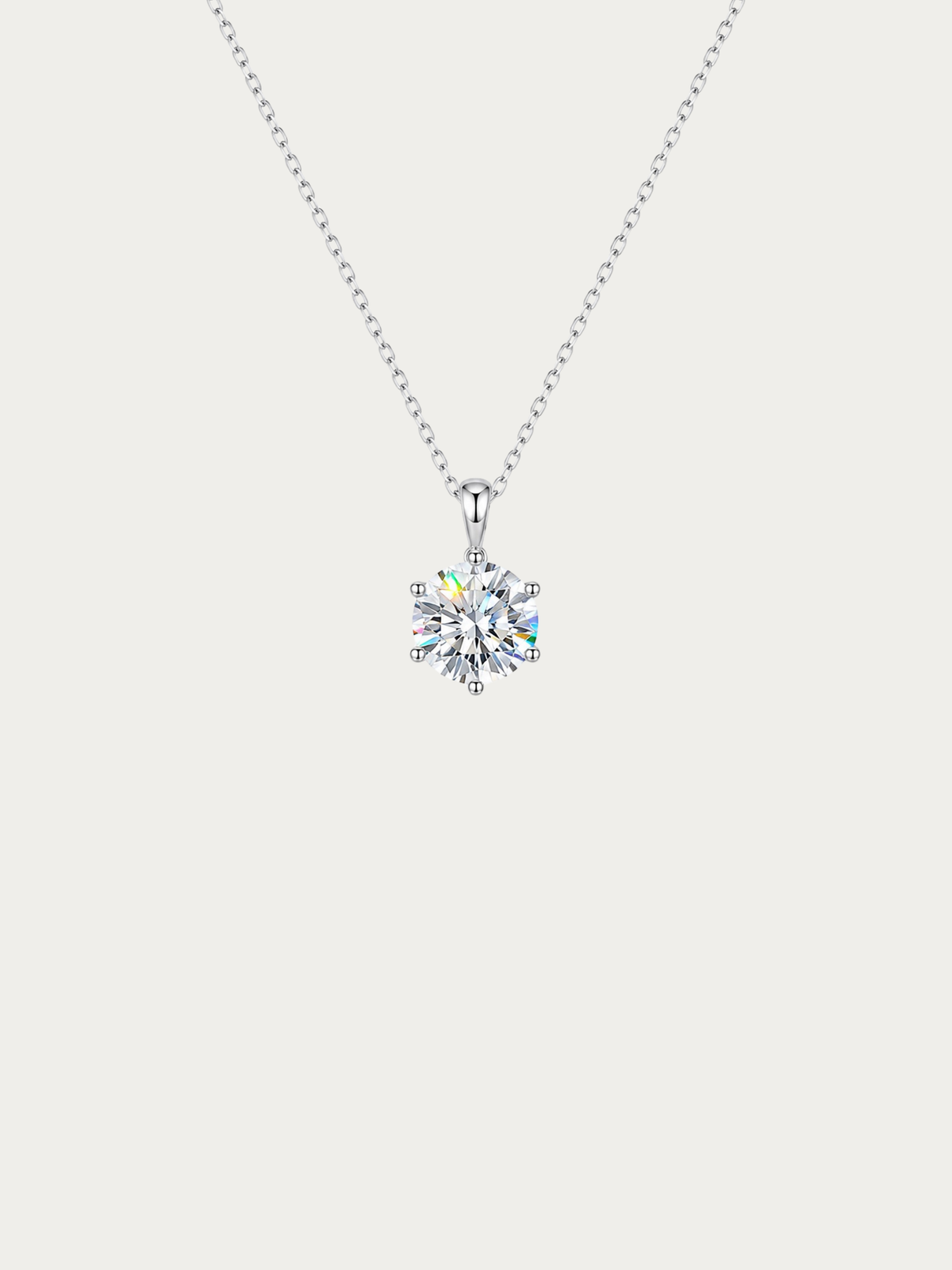Sawyer necklace with a 6.5mm round moissanite in a six-prong setting on a rhodium-plated 925 silver cable chain, front view