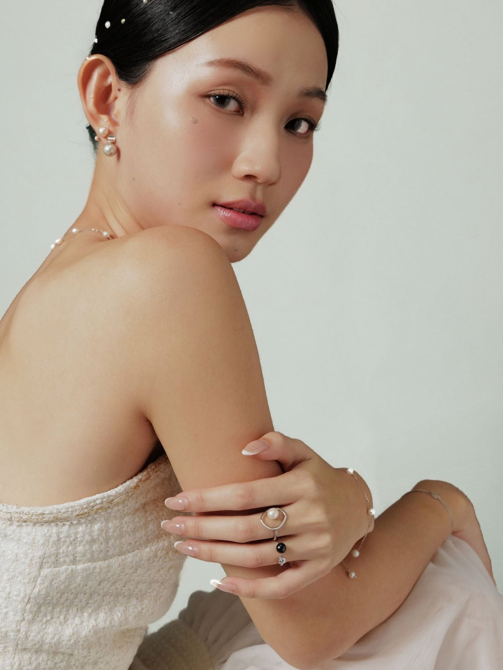 MNML Selene Pearl Open Ring in white and midnight blue variants flat lay — 925 silver pearl ring