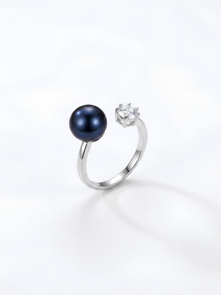Top-down view of Selene freshwater pearl and CZ open ring