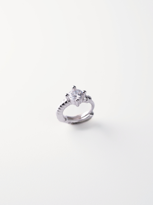 5A CZ solitaire close-up on MNML Selene Rope Crystal Huggie — four-prong crystal detail