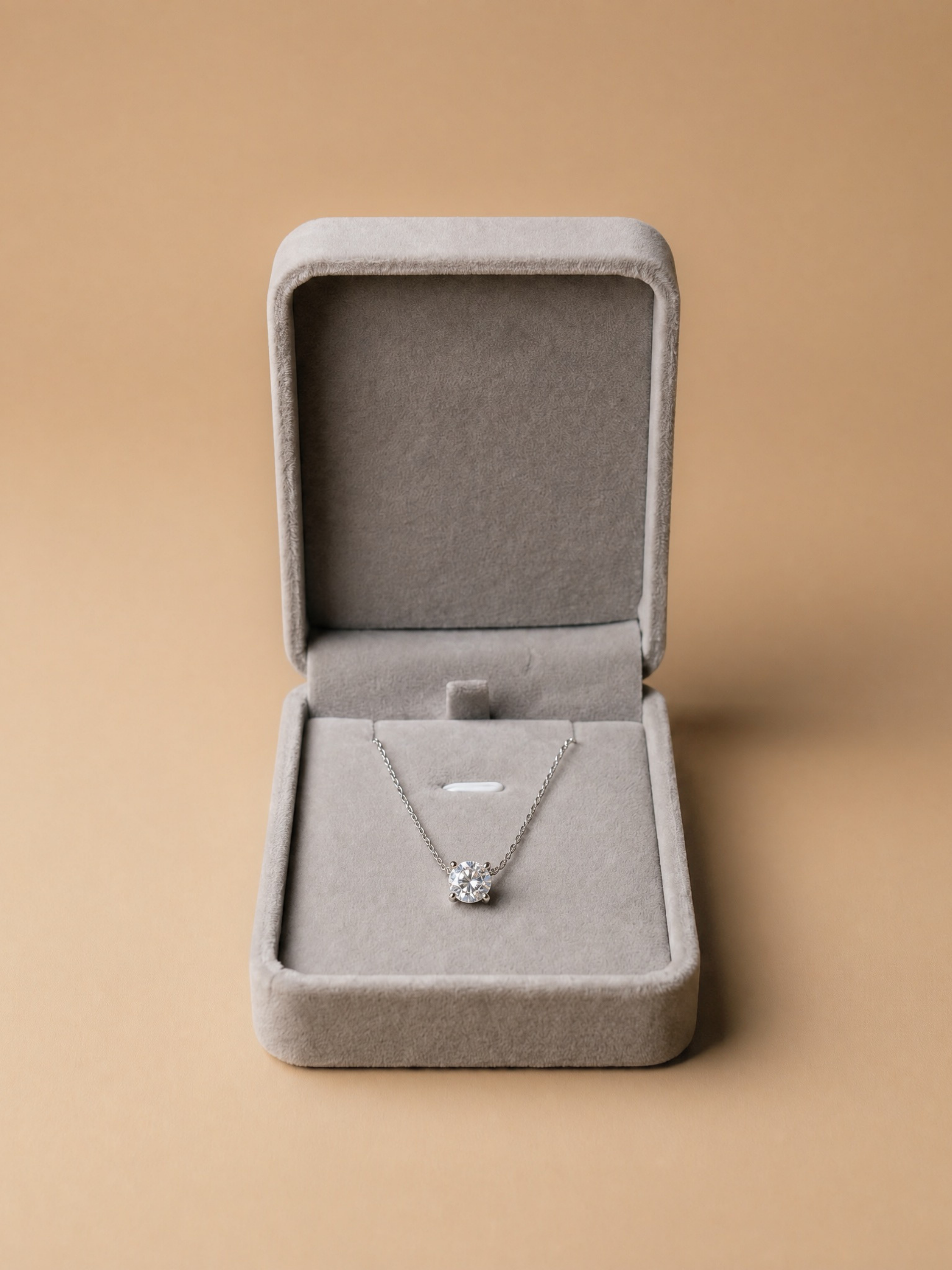 MNML Signature Case open, showing moissanite necklace inside 