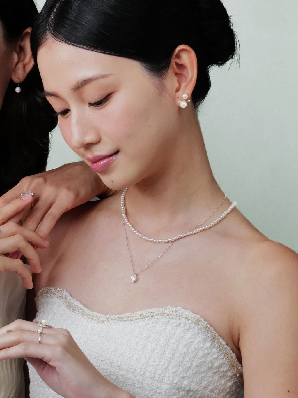 Sophie necklace layered with a pendant necklace