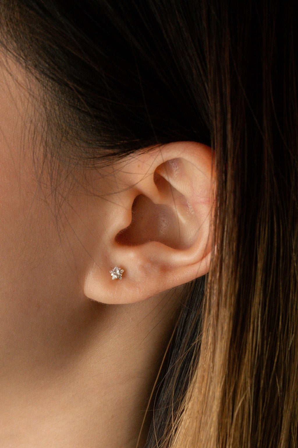 Model wearing MNML Star Coloured Diamond Stud Barbell Earrings at cartilage — barbell earrings Malaysia