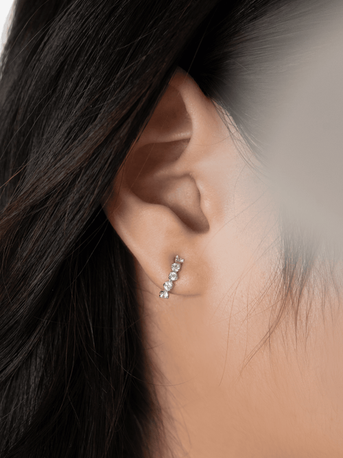 Starfall cascade stud worn on the ear lobe