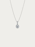 Sunrise solitaire necklace with a bezel-set round CZ under a pavé bail in rhodium-plated 925 sterling silver, front view