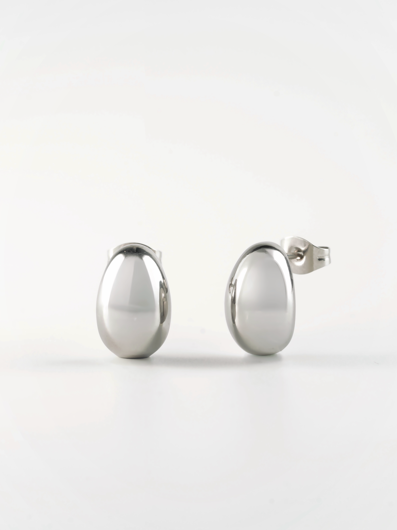 Tauri Soft Bean Dome Stud Earrings in polished stainless steel 