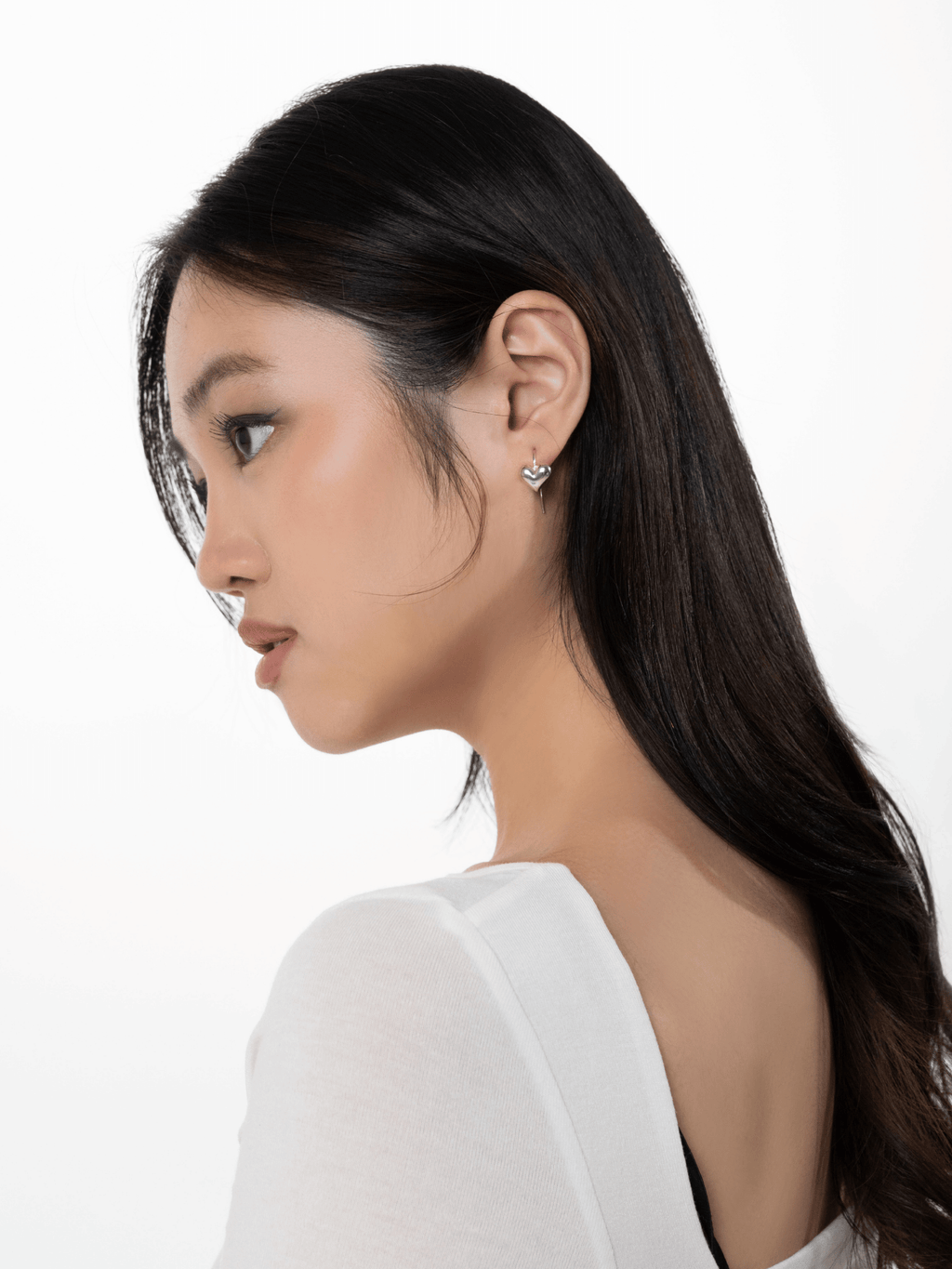 Tender Hearts hook earring worn on the ear
