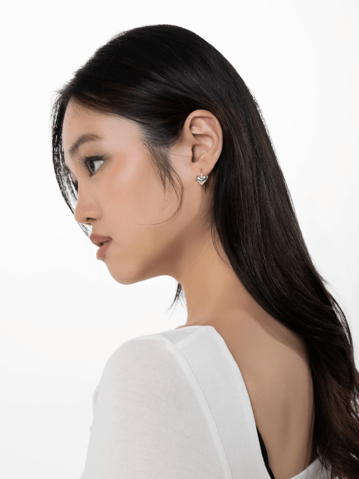 Tender Hearts hook earring worn on the ear
