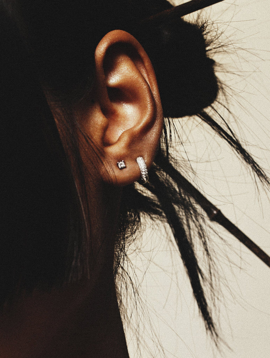 Pavé huggie close-up on MNML Terry Sterling Silver Earrings Set — double row CZ 7mm huggie