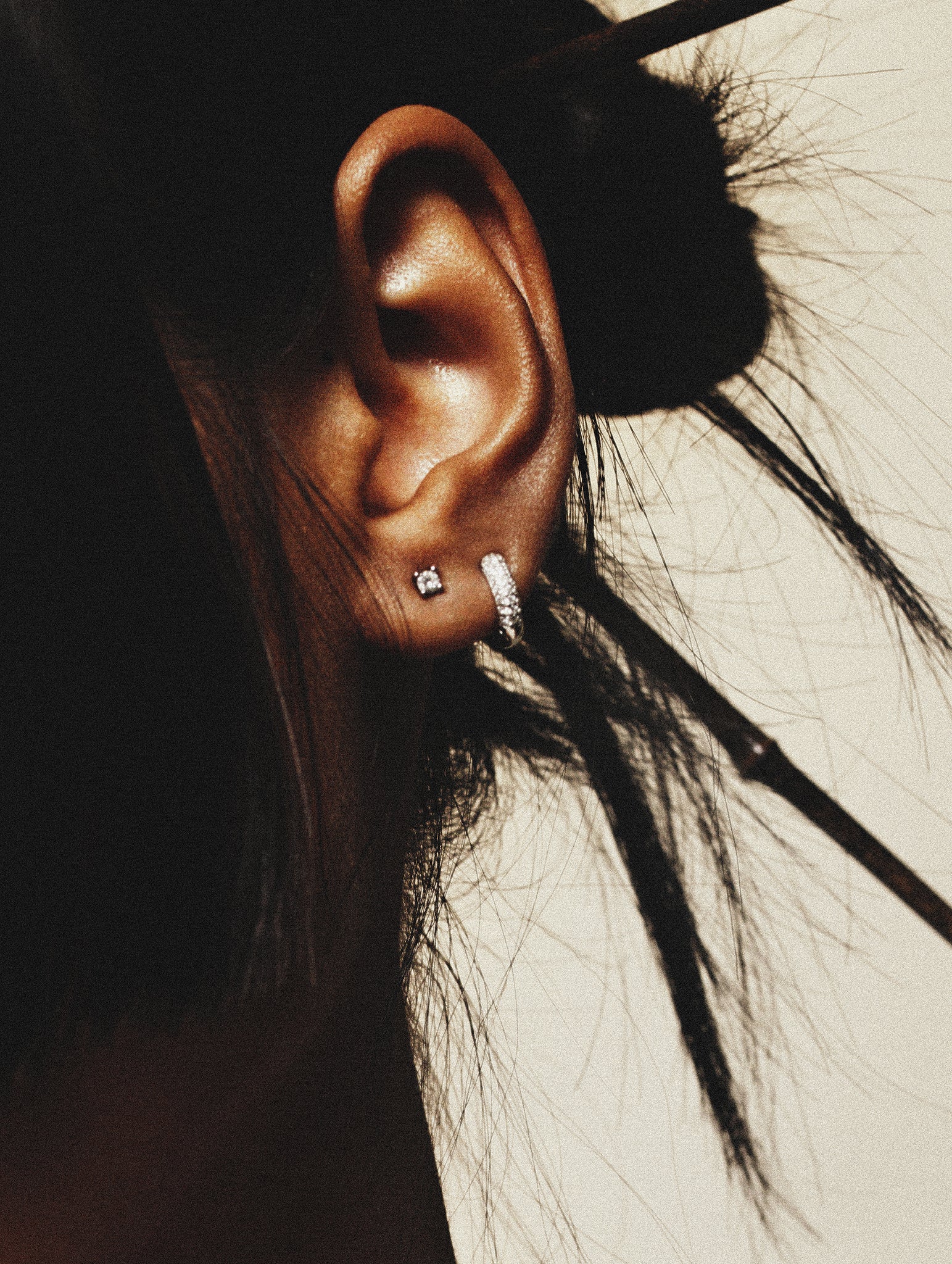 Pavé huggie close-up on MNML Terry Sterling Silver Earrings Set — double row CZ 7mm huggie
