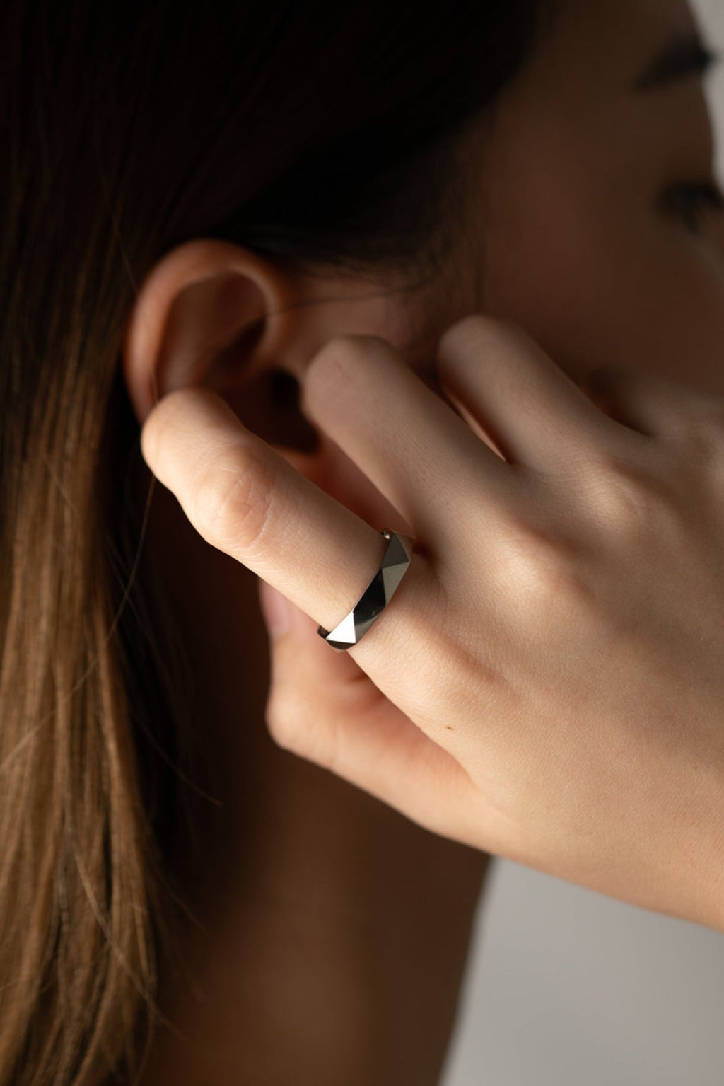 Female model wearing MNML Trion Rhombus Ring on finger — minimal geometric ring Malaysia