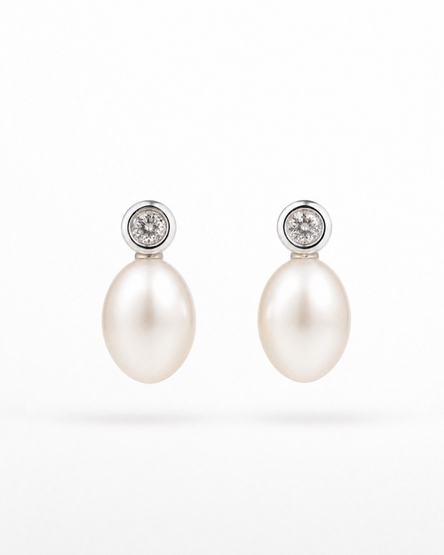 Tsuki Pearl Drop Stud Earrings in 925 sterling silver with bezel-set CZ 