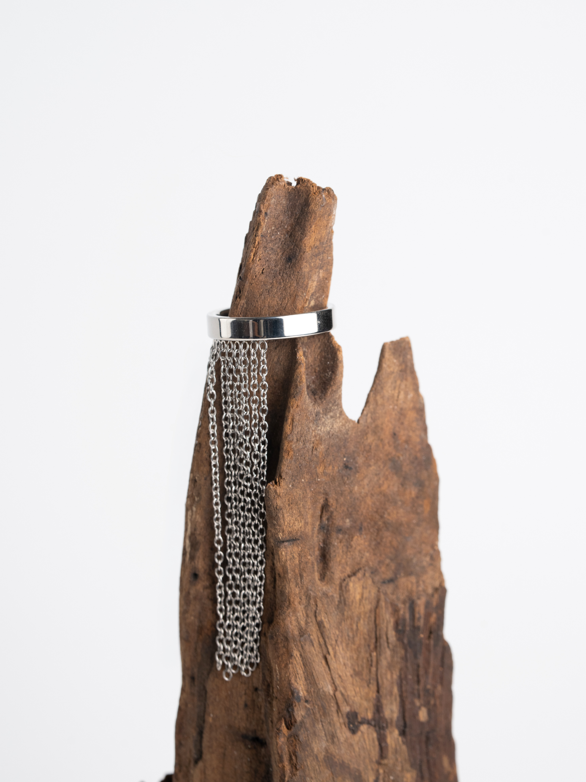 Close-up of cascading chain fringe on MNML Vanta Fringe Chain Ring — fluid movement detail