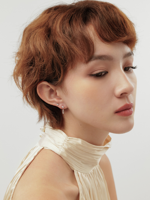 Model wearing MNML Vera Dangling Long Stone Flatback Stud at lobe — drop flatback ear curation Malaysia