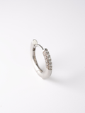 Close-up of rounded dome silhouette on MNML Zea Dome Pavé Huggie — sculptural 925 silver detail