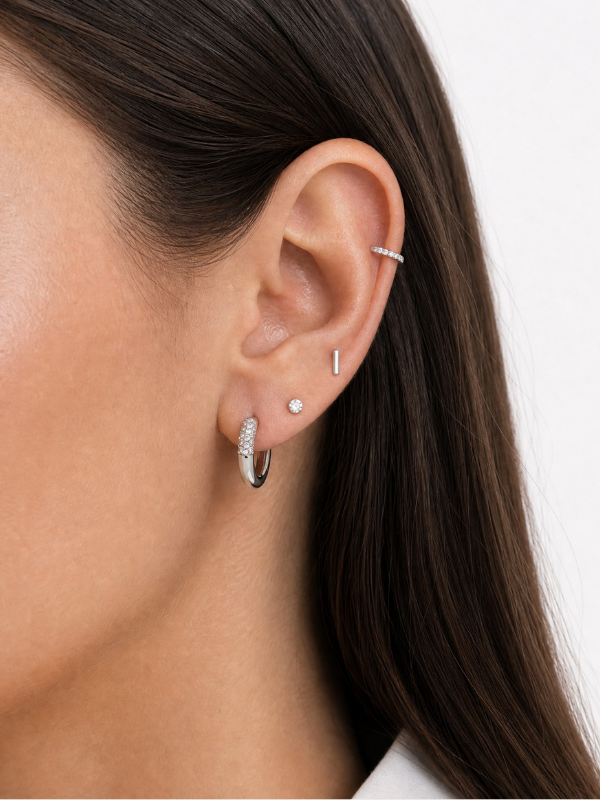 Model wearing MNML Zea Dome Pavé Huggie at lobe — sculptural pavé huggie ear curation Malaysia