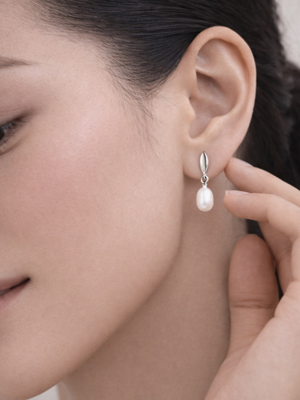 Model wearing MNML Zia Pearl Drop Earrings — minimal everyday pearl earrings Malaysia