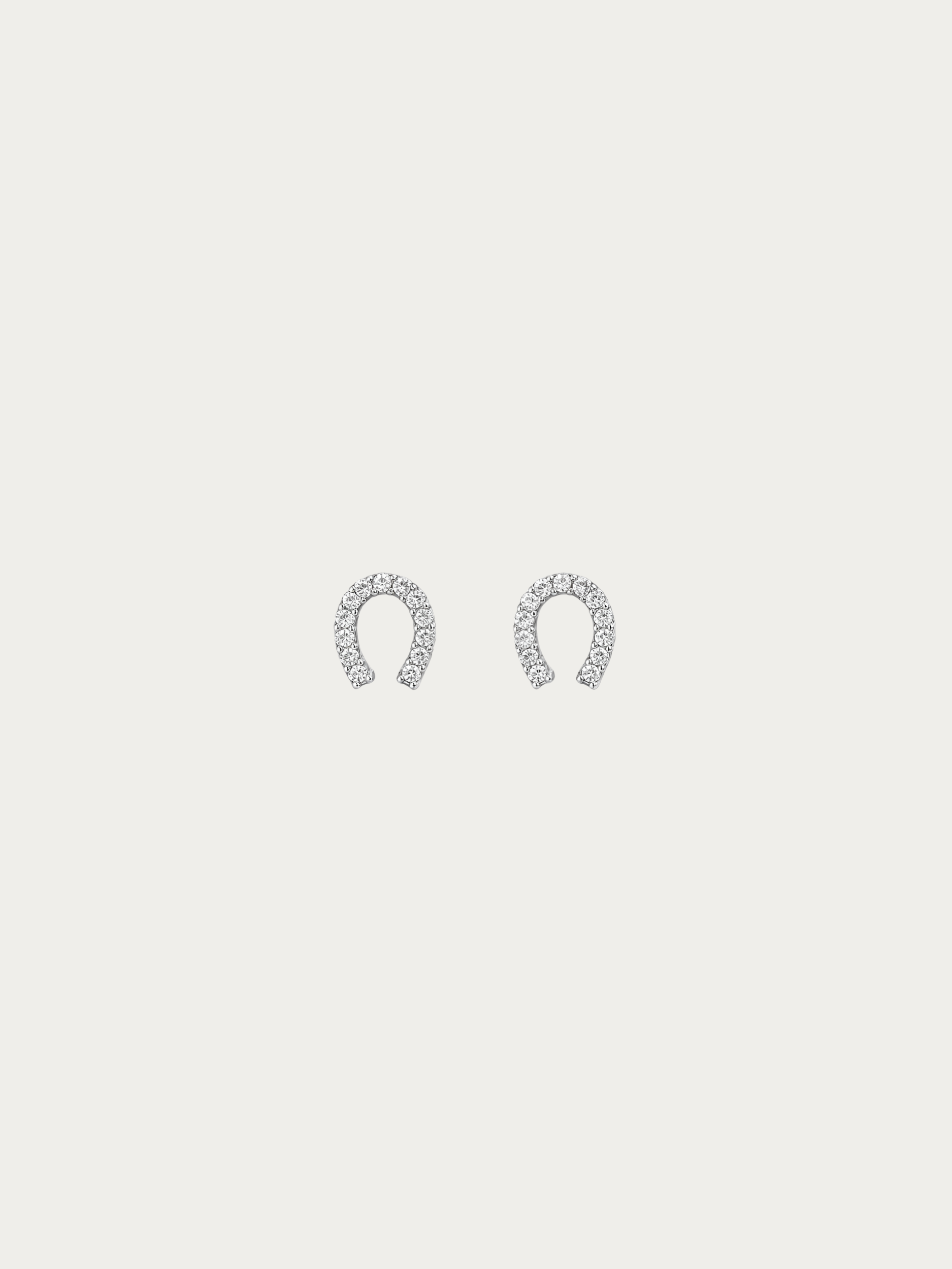 Nia Horseshoe Studs pair in 925 sterling silver with pavé cubic zirconia, studio hero shot