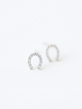 Macro detail of pavé cubic zirconia on Nia Horseshoe Studs