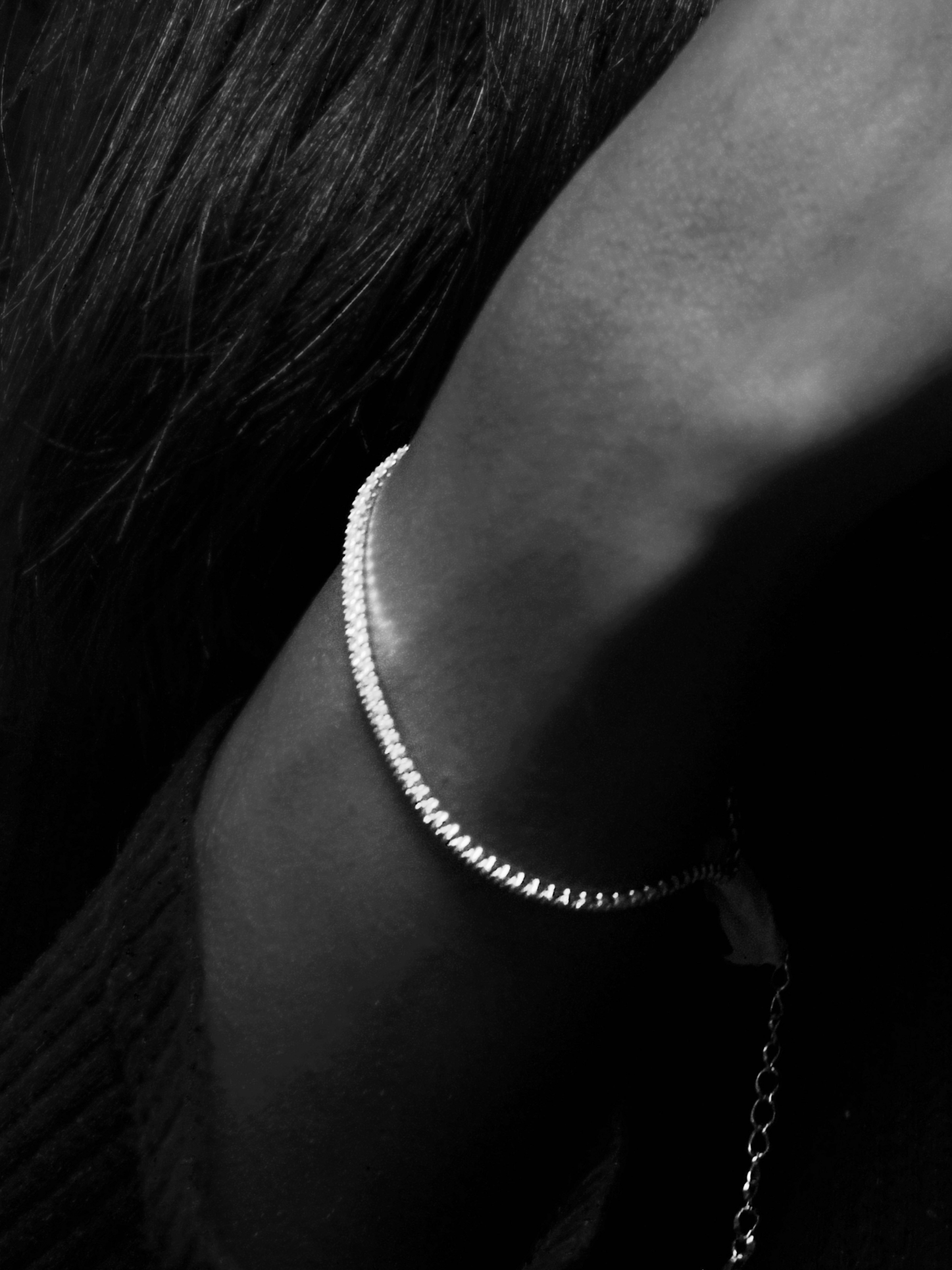 Close-up of NORA Tennis Paperclip Chain Bracelet lobster clasp and paperclip chain link detail