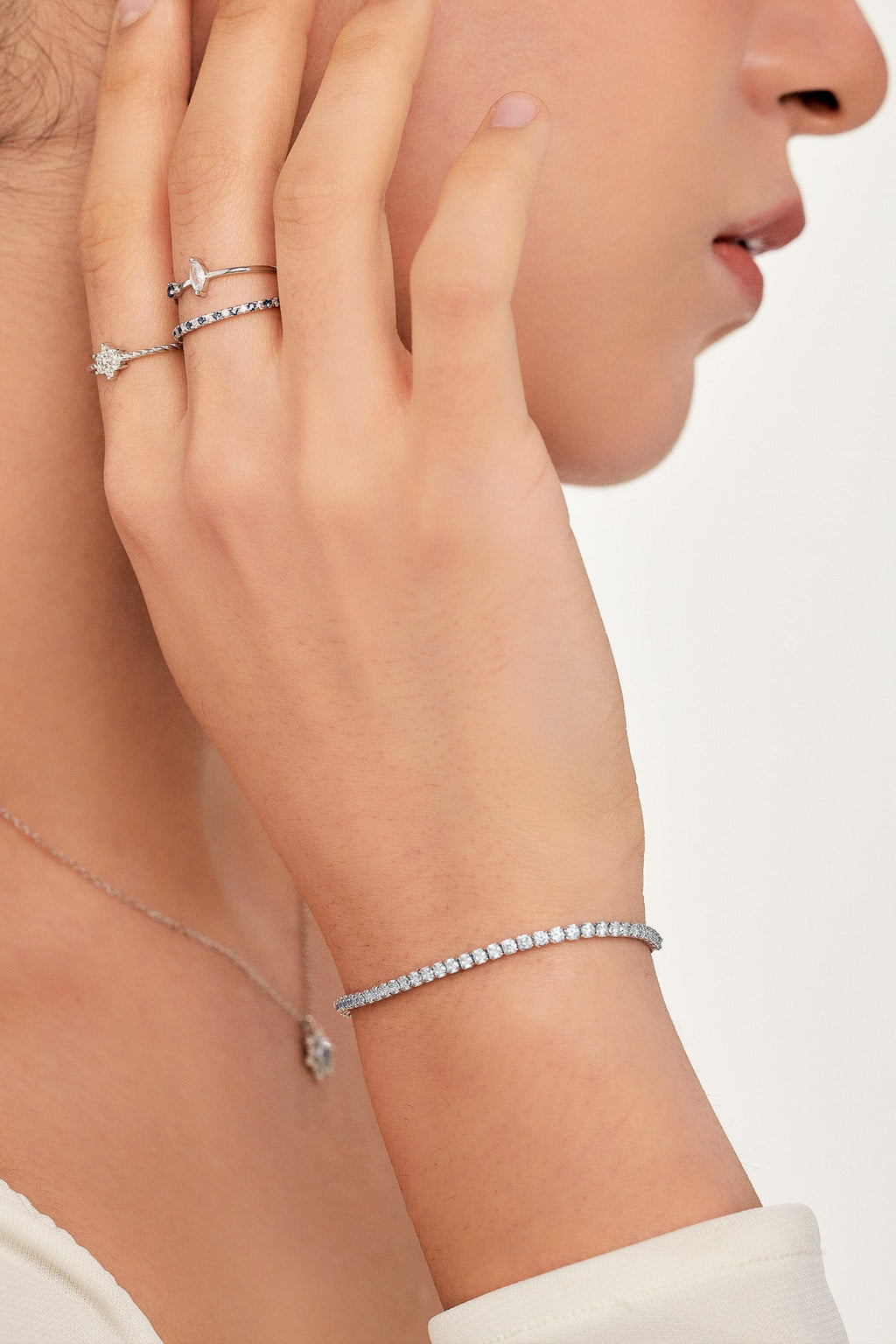 NORA Tennis Paperclip Chain Bracelet worn on wrist, silver finish