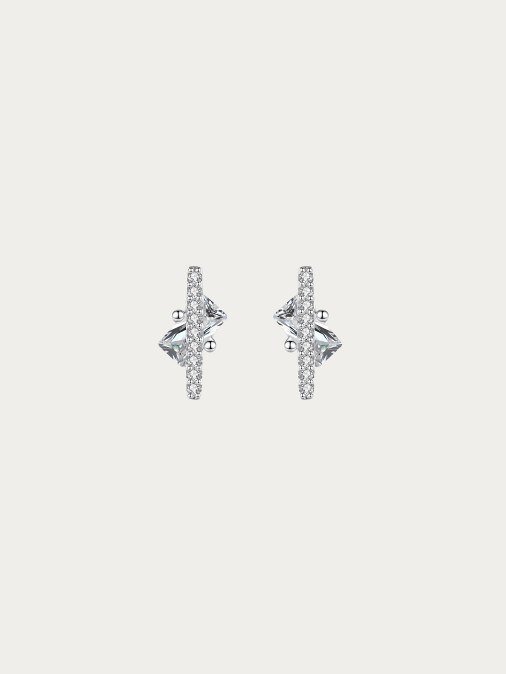 Nova Floating Prism Stud Earrings pair in 925 sterling silver with kite-cut cubic zirconia, studio hero shot