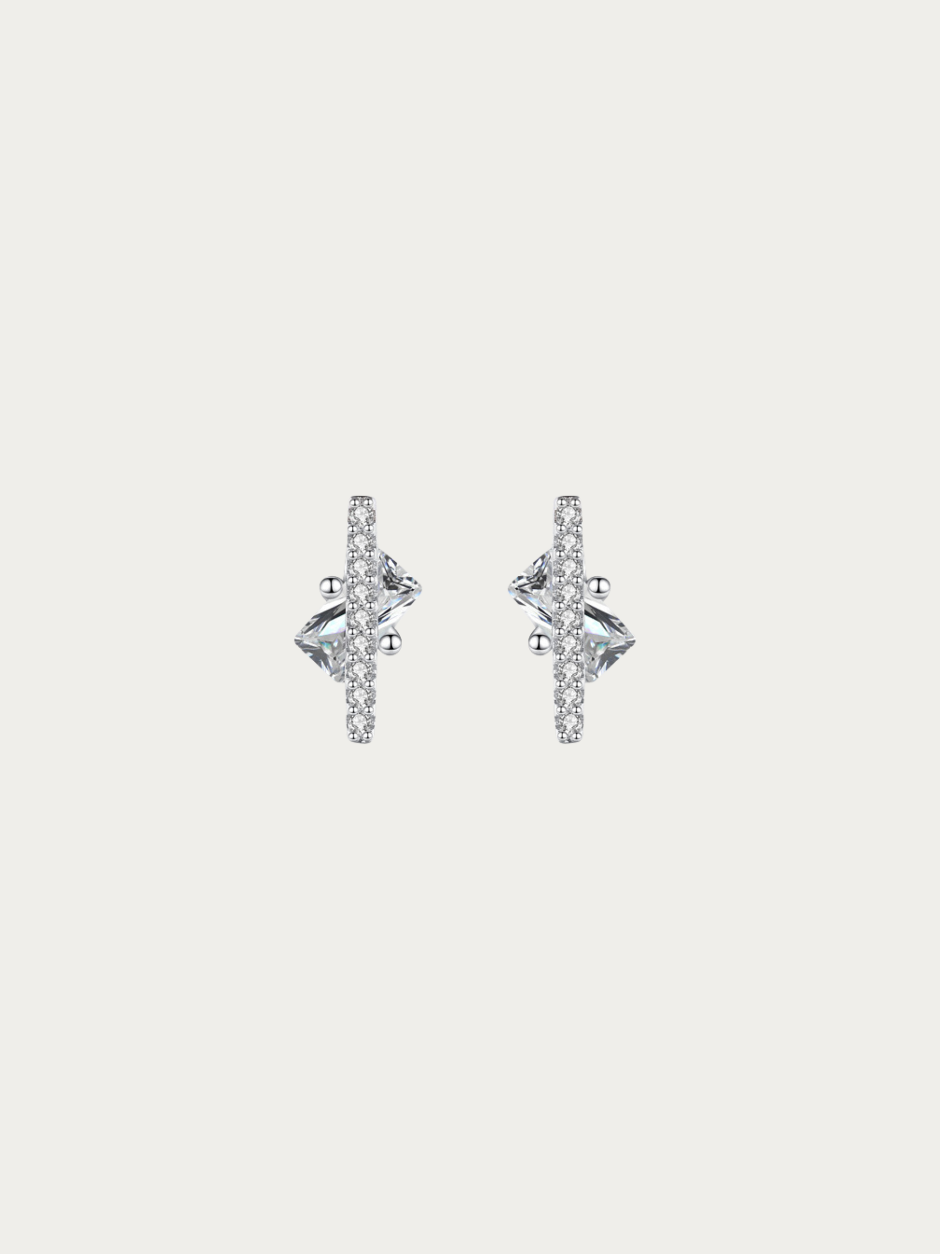 Nova Floating Prism Stud Earrings pair in 925 sterling silver with kite-cut cubic zirconia, studio hero shot