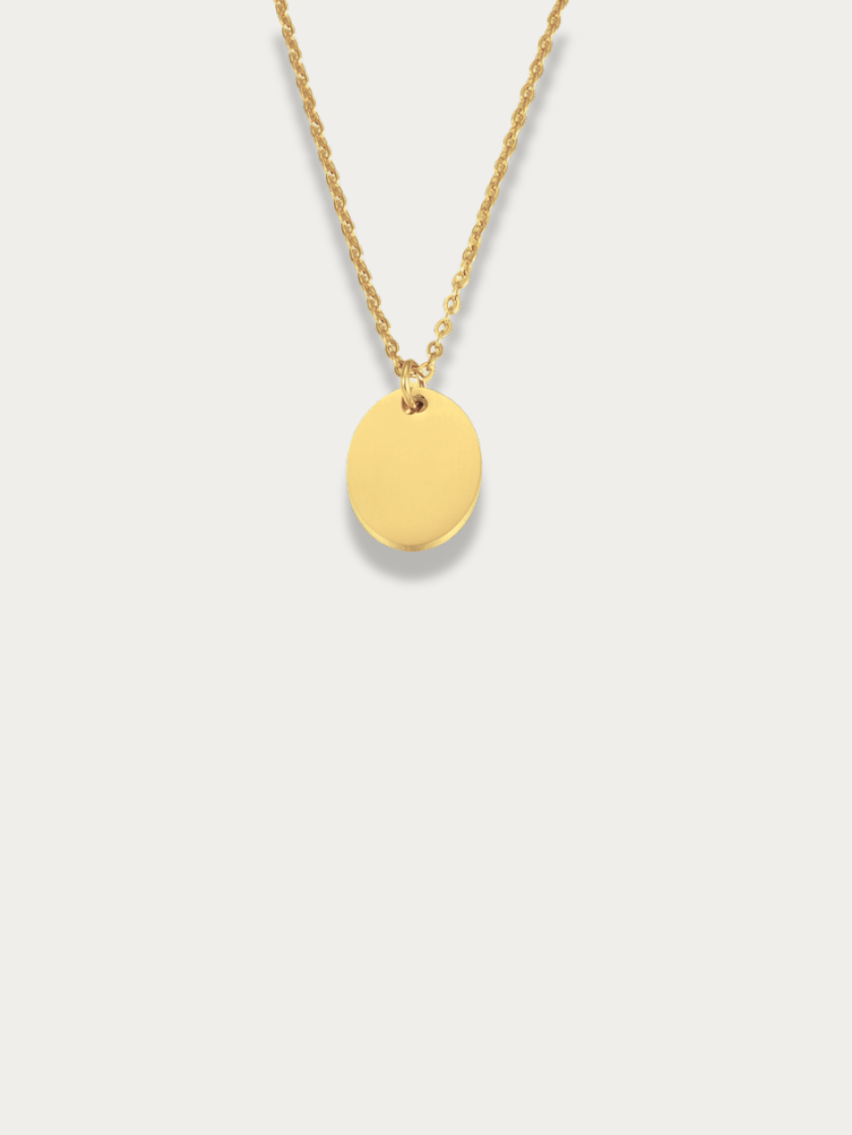 Oval Plate Engravable Necklace gold tone titanium, polished oval pendant on fine cable chain, flatlay