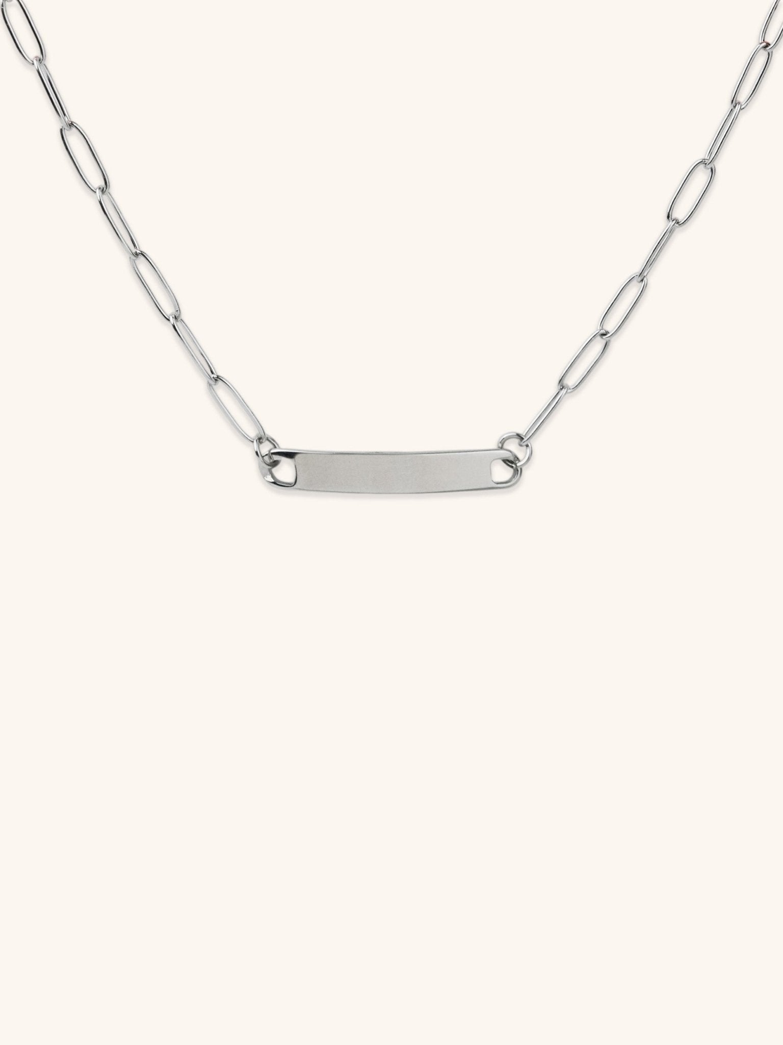 Paperclip Chain Engravable Plate Necklace silver tone stainless steel, wide bar plate on bold paperclip chain, product flatlay