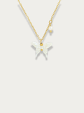 Penny White Butterfly Necklace gold tone titanium, white butterfly pendant with pearl accent, product flatlay