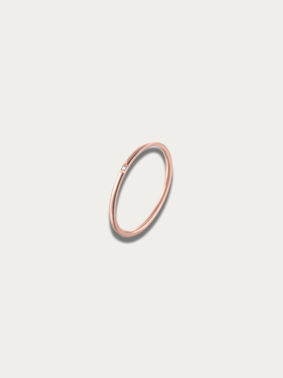Petite Gem Stacking Ring rose gold tone stainless steel, ultra-slim band with flush-set square CZ, product flatlay