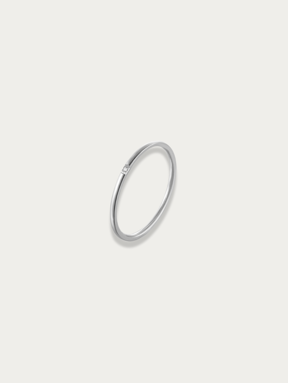 Petite Gem Stacking Ring silver tone stainless steel, ultra-slim band with flush-set square CZ, product flatlay