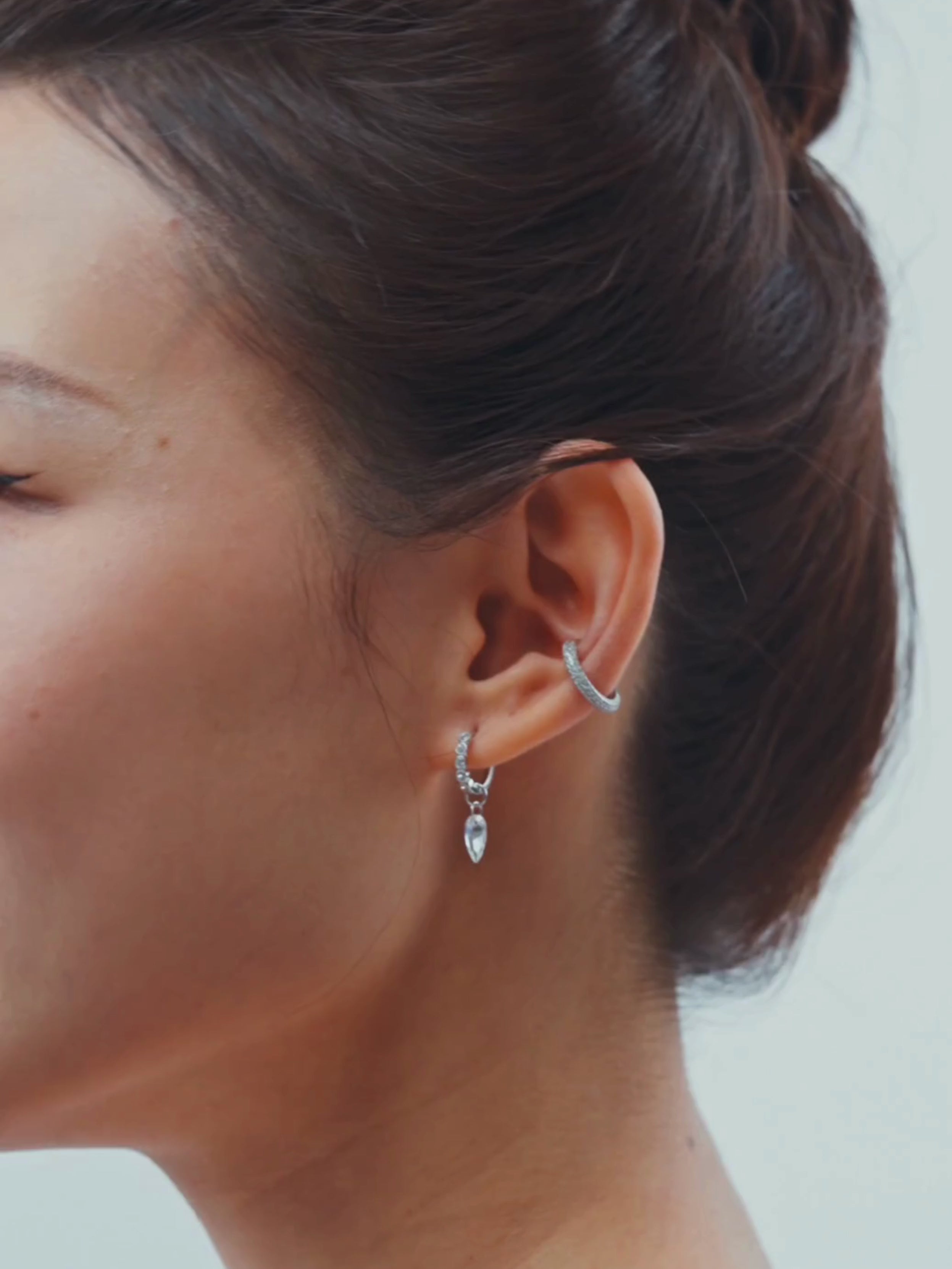MNML Cora Prism Stone Hoop in layered ear stack — stone drop hoop with studs and huggies