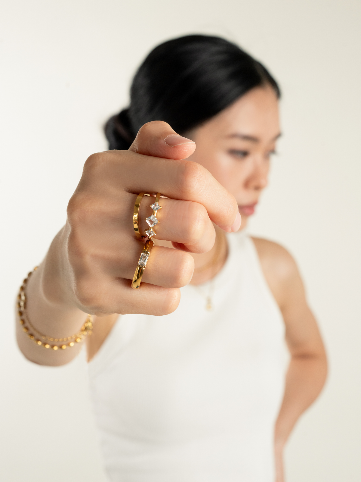 Pulse Three-Stone Ring worn on hand