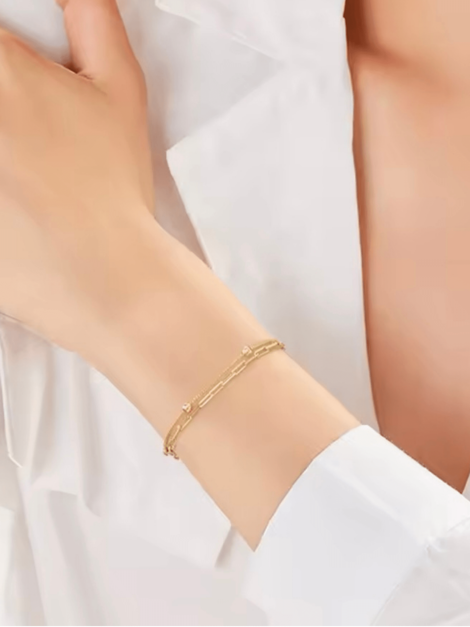 Model wearing REMY Paperclip Bead Chain Bracelet on wrist