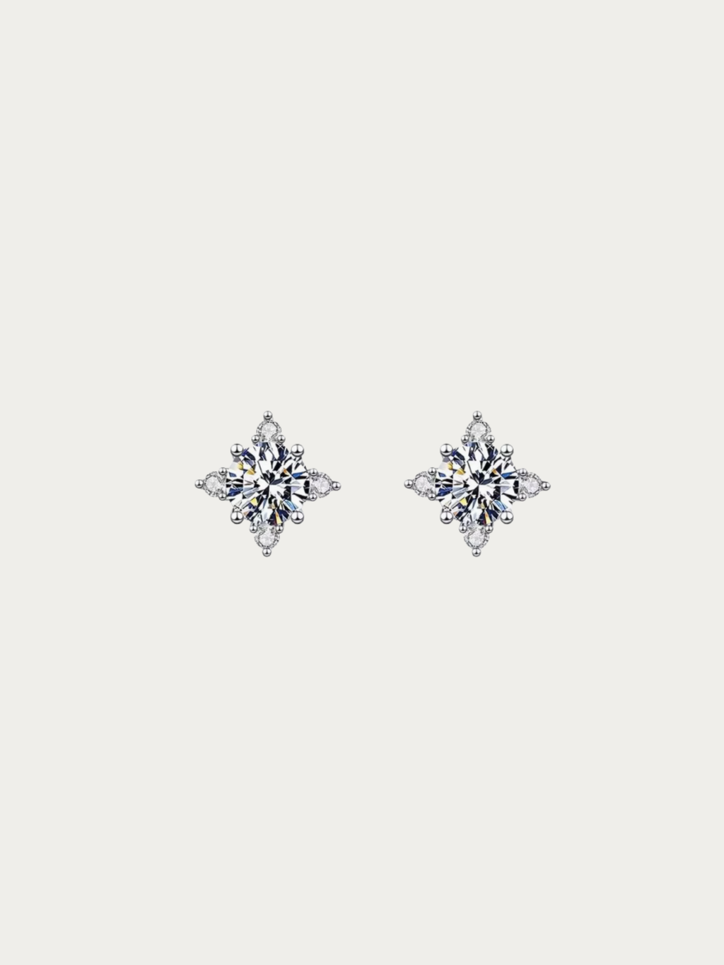 Rosaline 1-Carat Starburst Moissanite Stud Earrings pair in S925 silver with round brilliant centre stone, studio hero shot