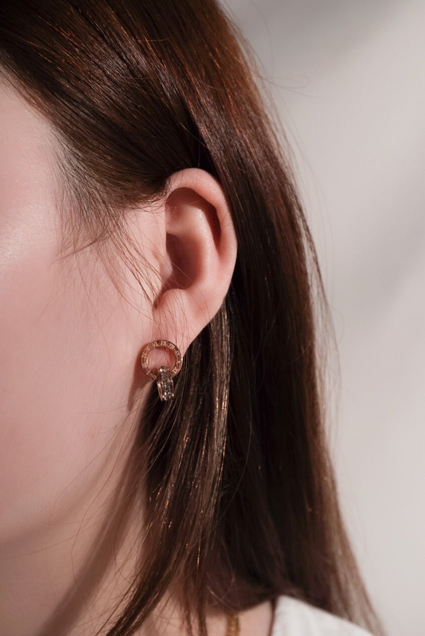 Rose gold Roman numeral stud earrings titanium