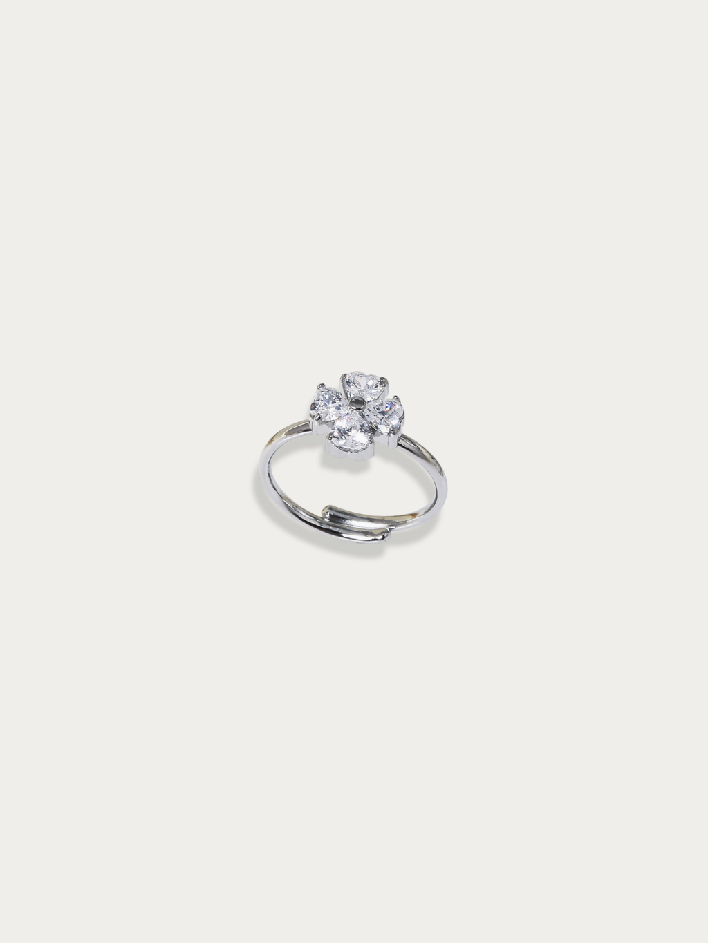 Spring Aura Ring with silver clover flower design set with cubic zirconia stones, studio hero shot