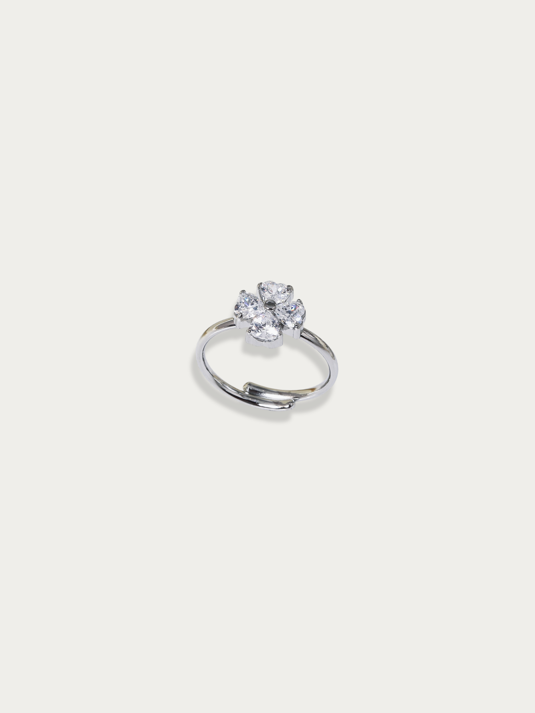 Spring Aura Ring with silver clover flower design set with cubic zirconia stones, studio hero shot