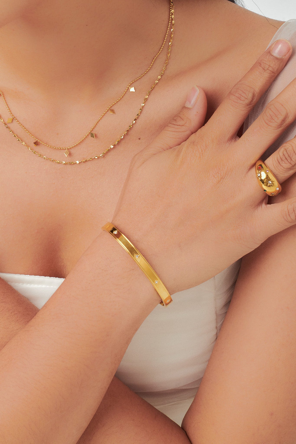 Star Spangled Bangle gold tone worn on wrist, minimalist CZ bangle Malaysia lifestyle