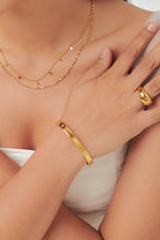 Star Spangled Bangle gold tone worn on wrist, minimalist CZ bangle Malaysia lifestyle