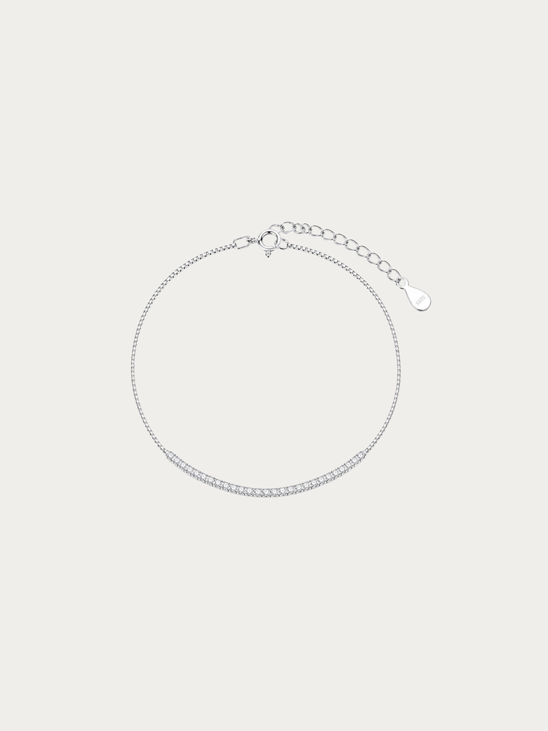 Stillness Semi Tennis Bracelet in S925 sterling silver with front-facing cubic zirconia row, studio hero shot