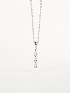 Close-up of three pear-cut stones on Tinker Dewdrop Necklace