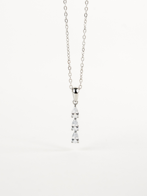 Close-up of three pear-cut stones on Tinker Dewdrop Necklace