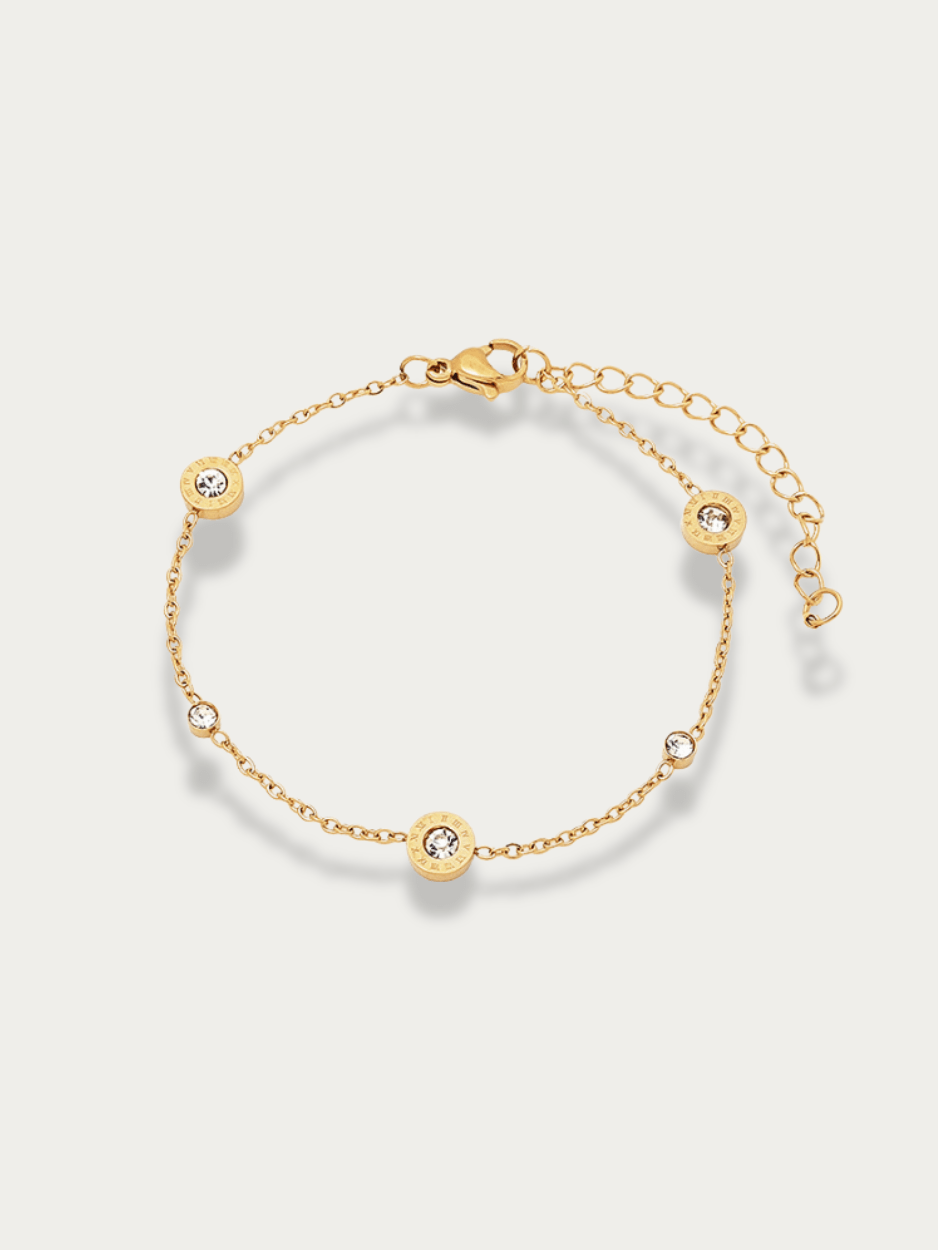 Trio Roman Numerals Diamonds Bracelet in gold titanium with three engraved discs and cubic zirconia accents, studio hero shot