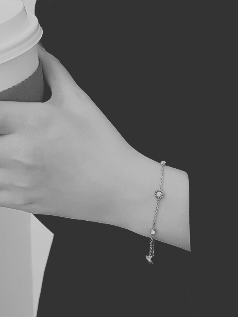 Trio Roman Numerals Diamonds Bracelet worn on wrist