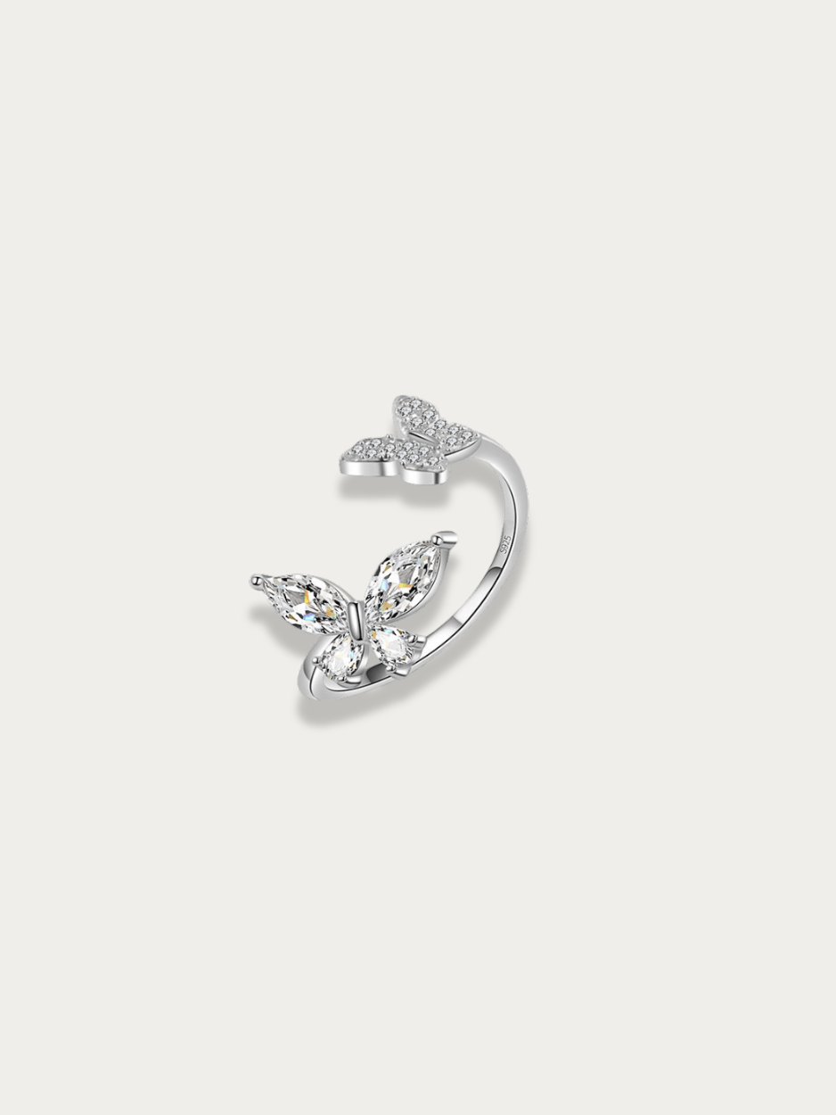 Twilight Flutter Ring full front view, silver butterfly open band