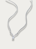 Statement silver tone necklace with teardrop stone